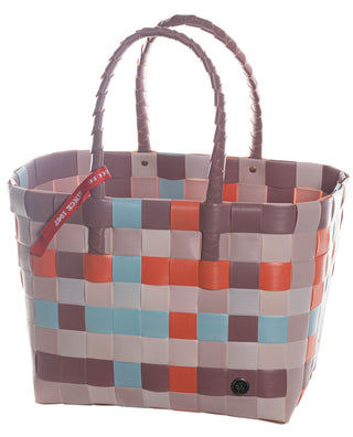 Die Witzgall Shopper 5010-31 weiß/orange/gelb/braun Tragetasche verfügt über zwei Griffe und ein kleines rotes Etikett, hergestellt aus strapazierfähigen Kunststoffbändern.