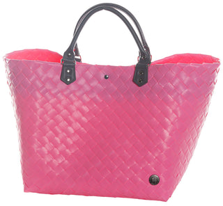 Der Witzgall Shopper Klassik 5110 ist eine rosa gewebte Tragetasche mit Kunstledergriffen, einem kleinen runden Emblem am unteren Rand und in trendigen Farben erhältlich.